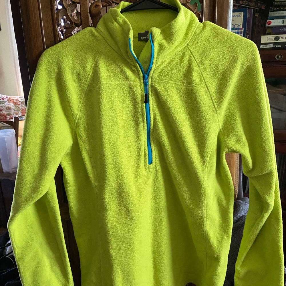 Neon green jacket with blue zipper